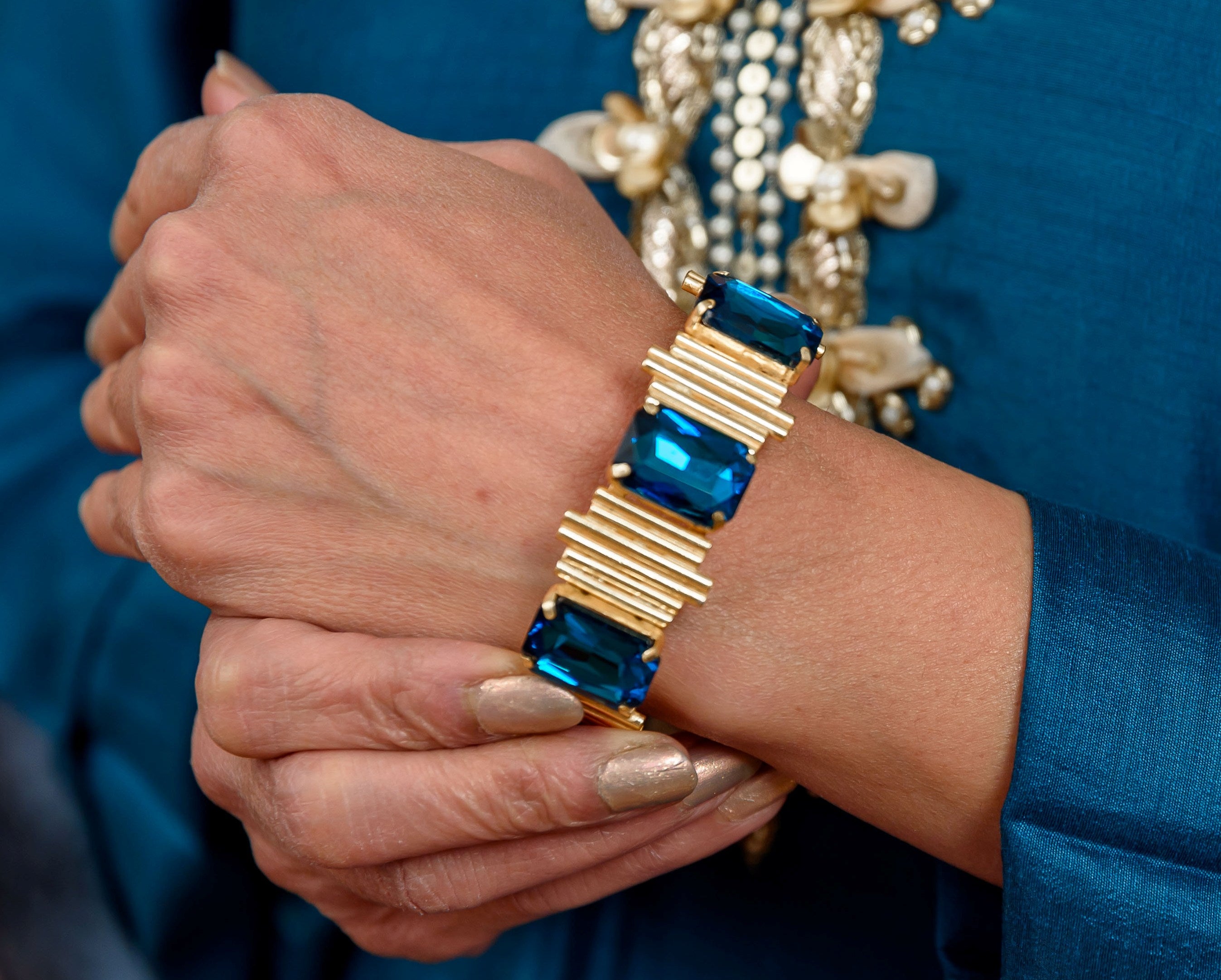 Delicate Golden Bracelet with Blue Emeralds